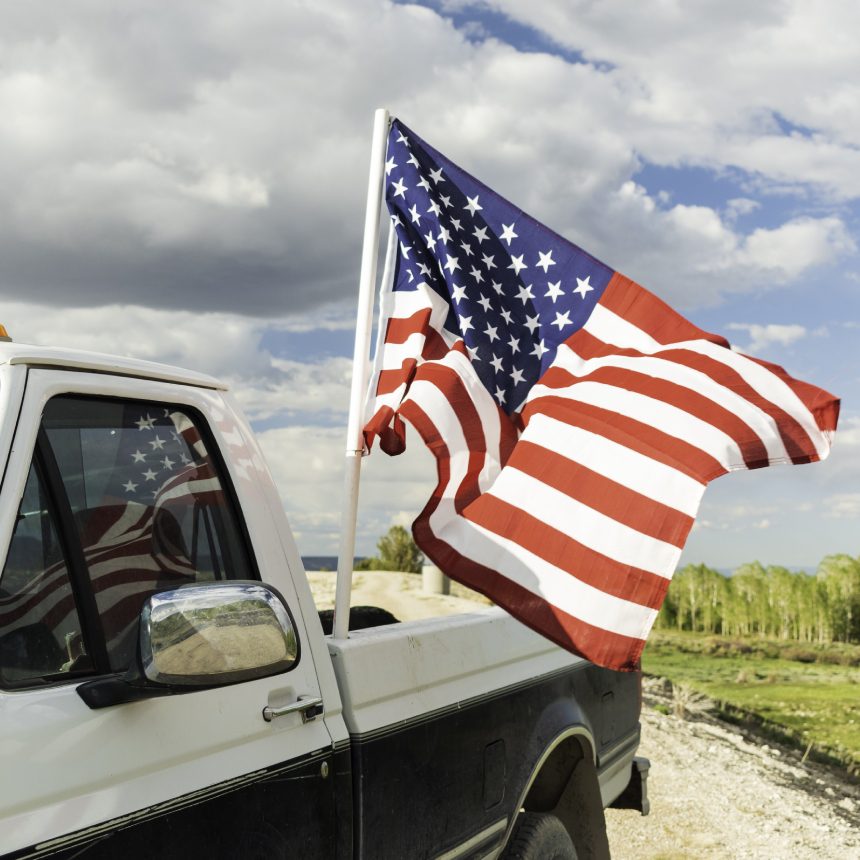 American flag on pickup truck.