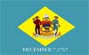 Here's an alt tag for the image: Delaware state flag.